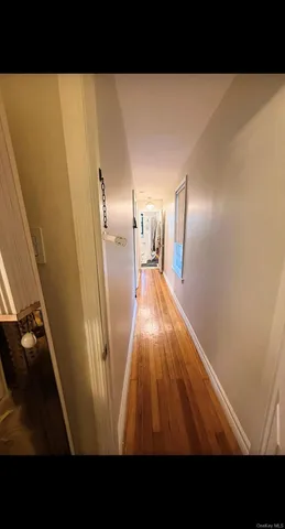 a view of an empty room with stairs