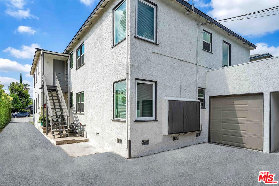 11575 Riverside Drive Valley Village, CA 91602 - Photo 15 of 16 a view of a house with garage