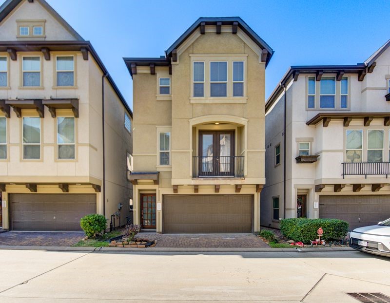 10014 Spring Shadows Park Circle Houston, TX 77080 - Photo 1 of 39 a front view of a building