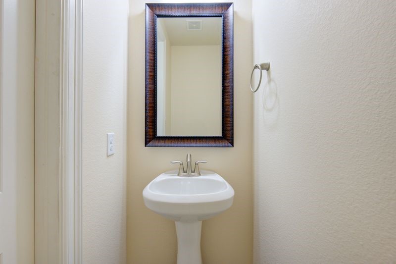 10014 Spring Shadows Park Circle Houston, TX 77080 - Photo 12 of 39 a bathroom with a sink and a mirror