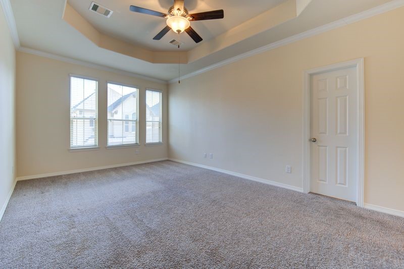 10014 Spring Shadows Park Circle Houston, TX 77080 - Photo 19 of 39 a view of an empty room with a window