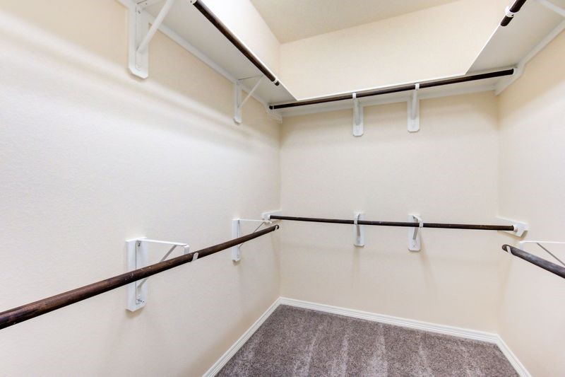 10014 Spring Shadows Park Circle Houston, TX 77080 - Photo 24 of 39 a view of walk in closet