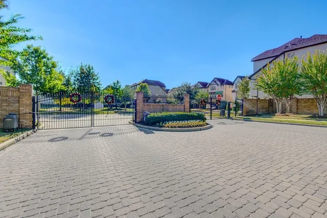 a view of swimming pool with a yard and a fountain