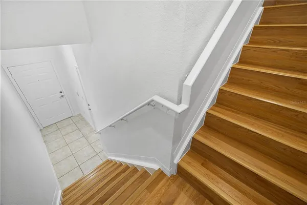 a view of an empty room with glass door