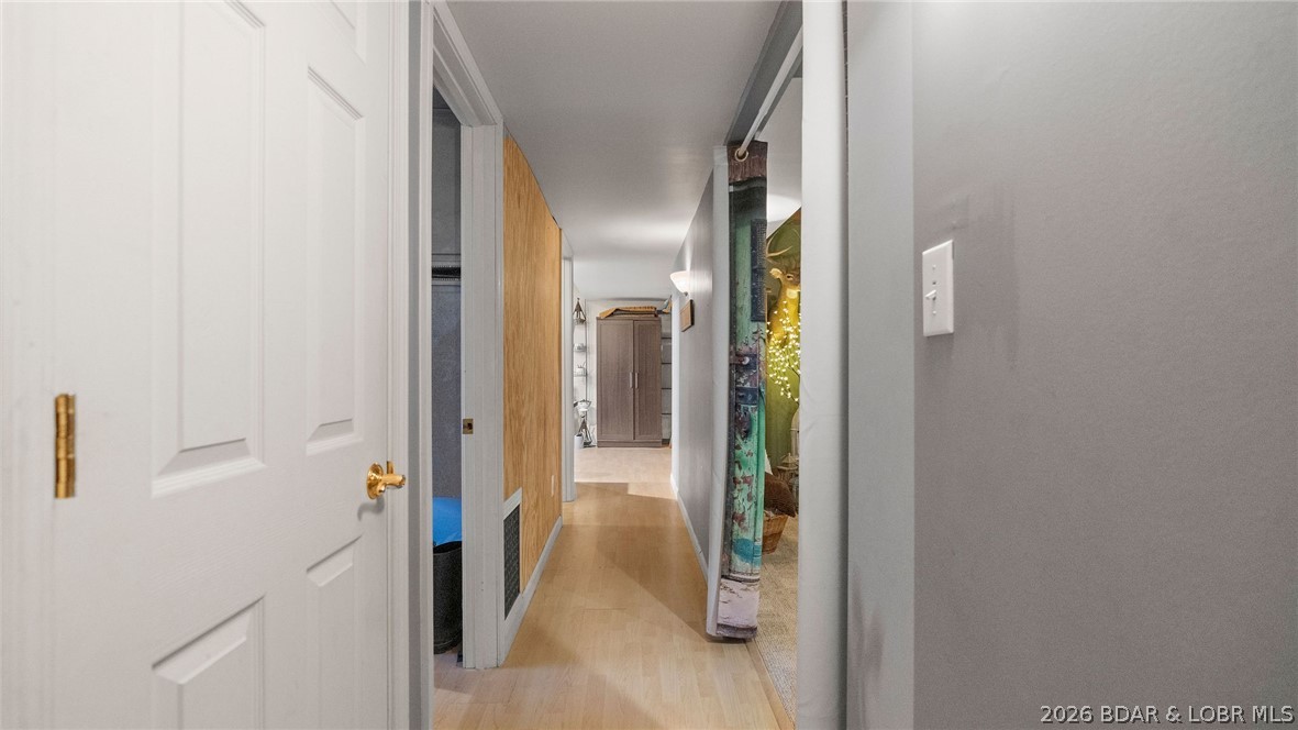 46 County Rd MM-10 Eugene, MO 65032 - Photo 44 of 65 Downstairs hall to living area