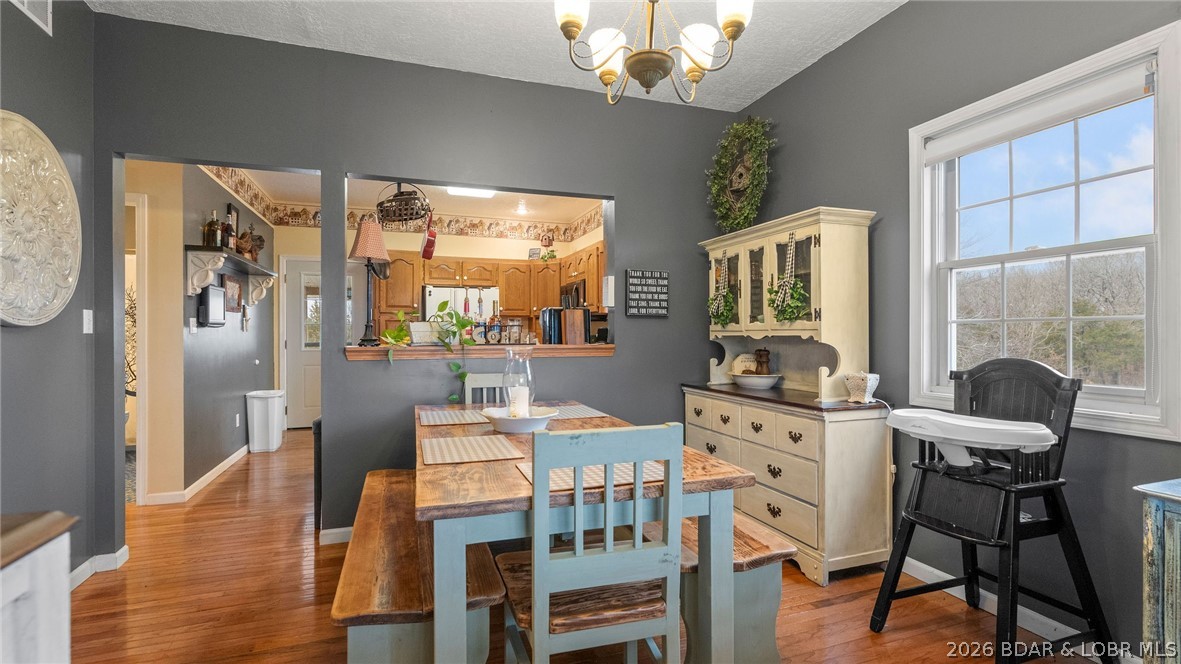 46 County Rd MM-10 Eugene, MO 65032 - Photo 7 of 65 Dining to kitchen