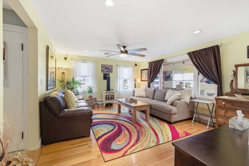 5 West Kenneth Street Lawrence, MA 01843 - Photo 12 of 41 a living room with furniture and a large window