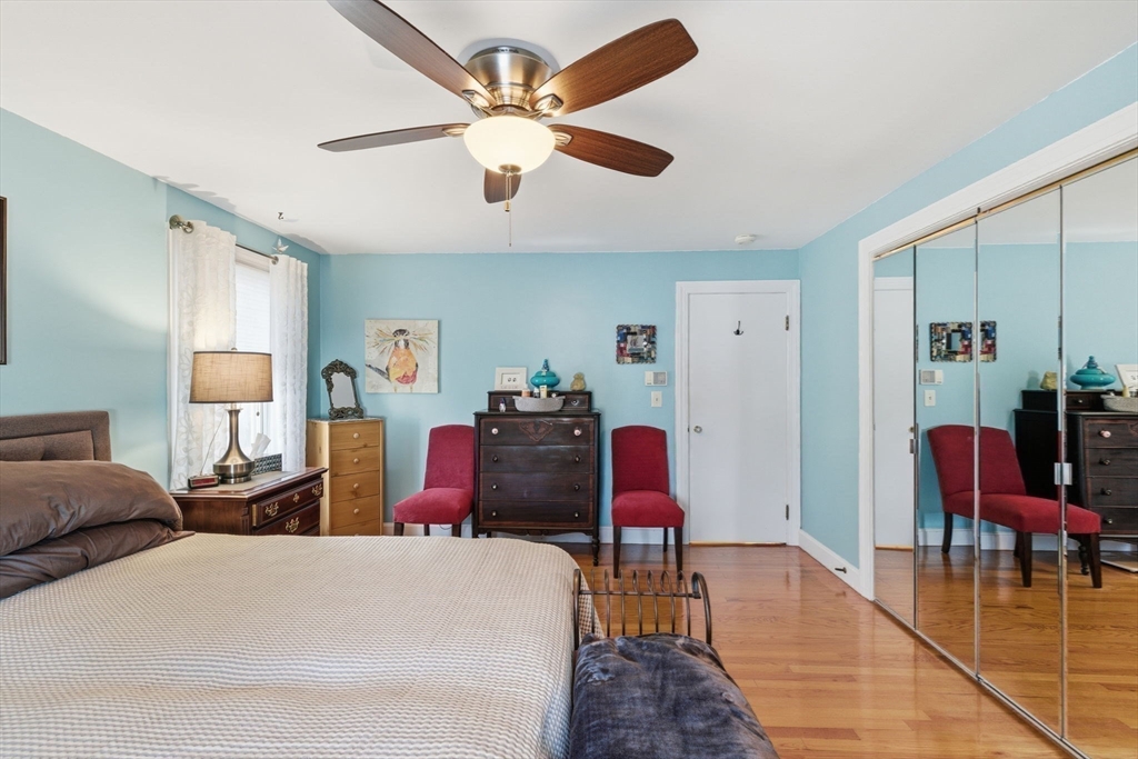 5 West Kenneth Street Lawrence, MA 01843 - Photo 18 of 41 a bed room with a bed furniture and a large window