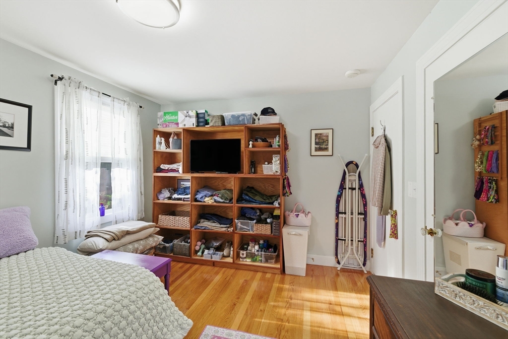 5 West Kenneth Street Lawrence, MA 01843 - Photo 24 of 41 a bedroom with furniture and a flat screen tv
