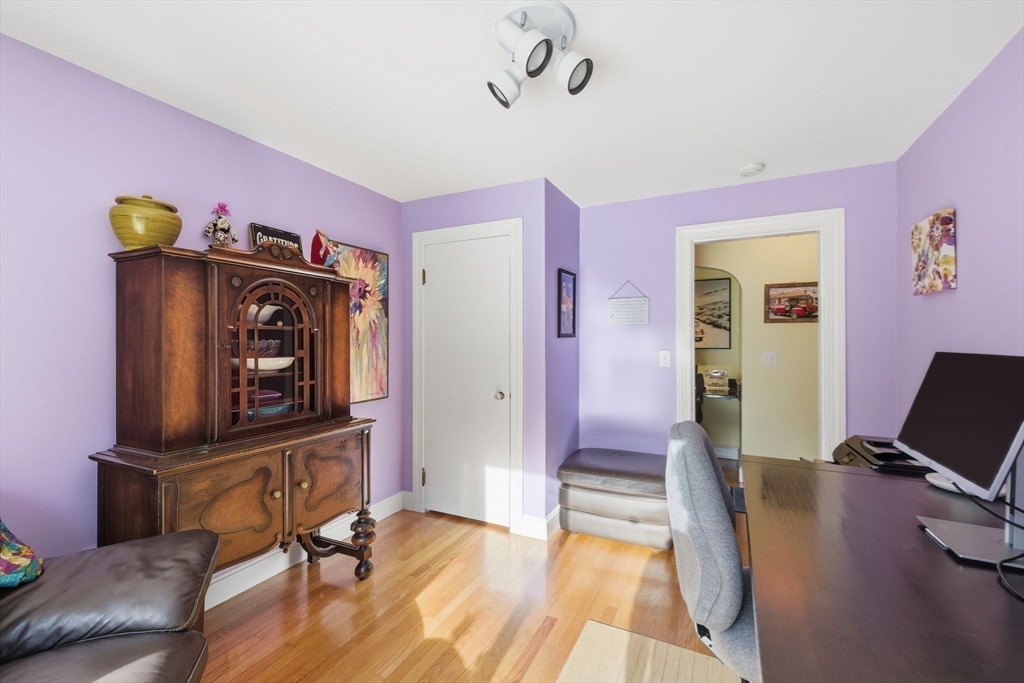 5 West Kenneth Street Lawrence, MA 01843 - Photo 25 of 41 a view of a livingroom with furniture and a workspace