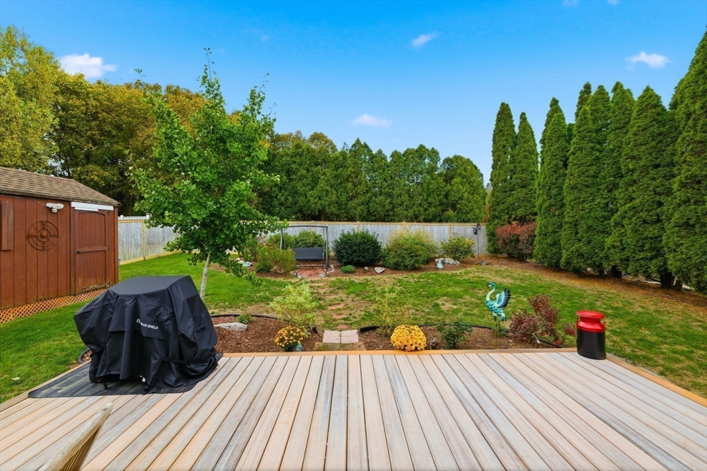 5 West Kenneth Street Lawrence, MA 01843 - Photo 26 of 41 a view of a backyard with sitting area