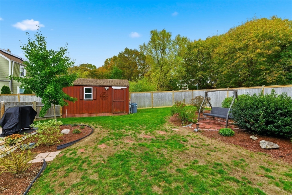 5 West Kenneth Street Lawrence, MA 01843 - Photo 27 of 41 a view of backyard with outdoor seating and green space