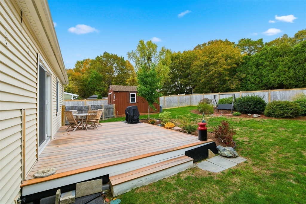 5 West Kenneth Street Lawrence, MA 01843 - Photo 28 of 41 a view of a backyard with sitting area