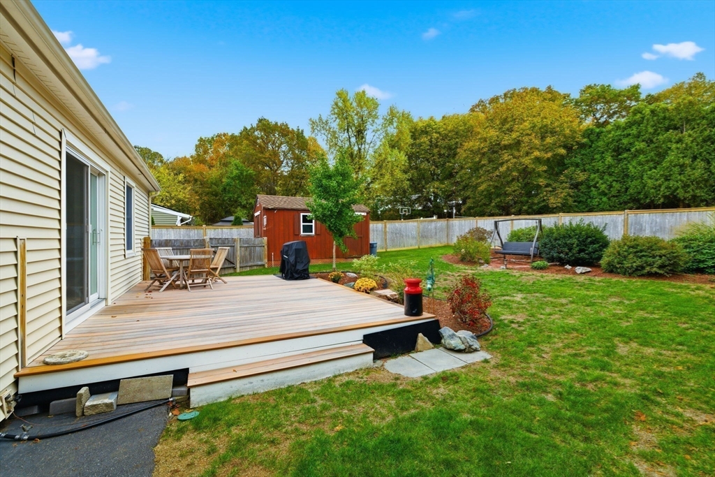 5 West Kenneth Street Lawrence, MA 01843 - Photo 31 of 41 a view of backyard with trampoline