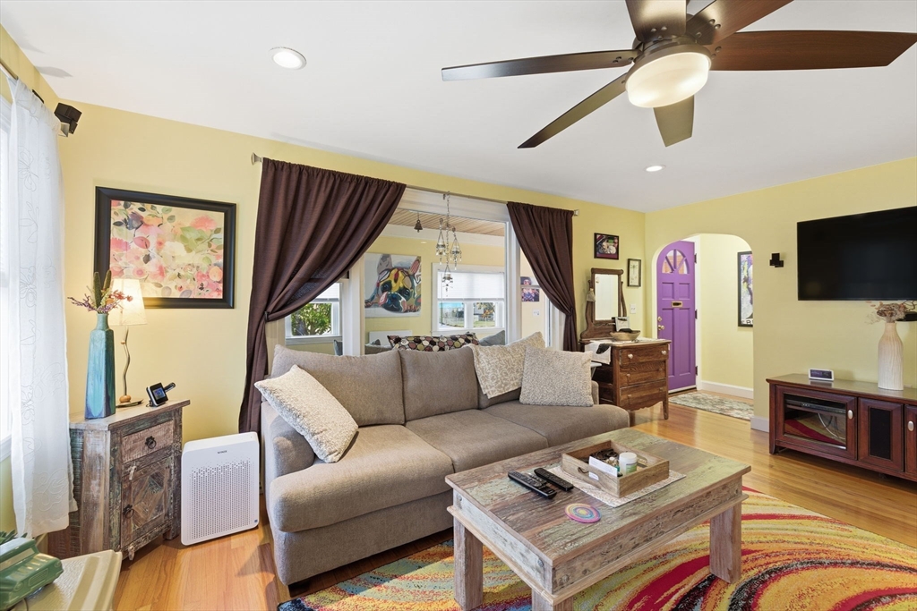 5 West Kenneth Street Lawrence, MA 01843 - Photo 9 of 41 a living room with furniture and a flat screen tv