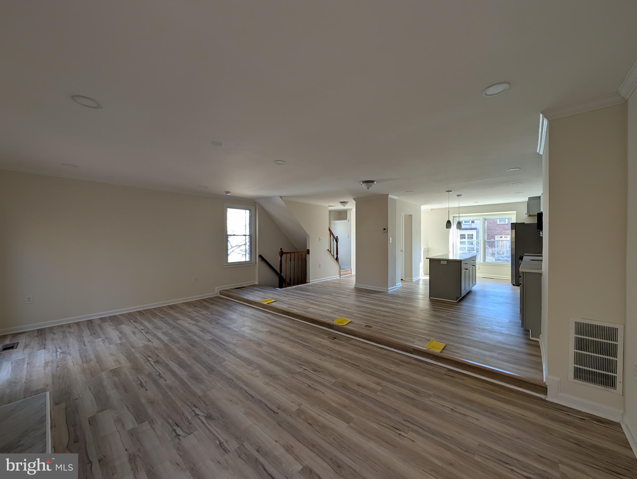 8108 Squirrel Run Road Springfield, VA 22152 - Photo 8 of 16 a view of empty room with wooden floor and window