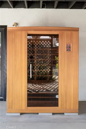 a view of a potted plant in front of a door