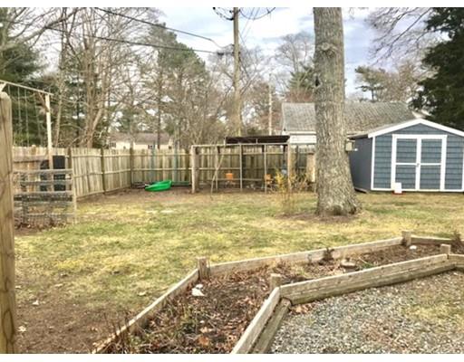 87 Parkwood Drive Wareham, MA 02571 - Photo 19 of 22 a view of a house with a yard