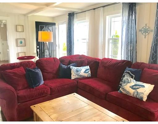 87 Parkwood Drive Wareham, MA 02571 - Photo 3 of 22 a living room with a couch and a large window