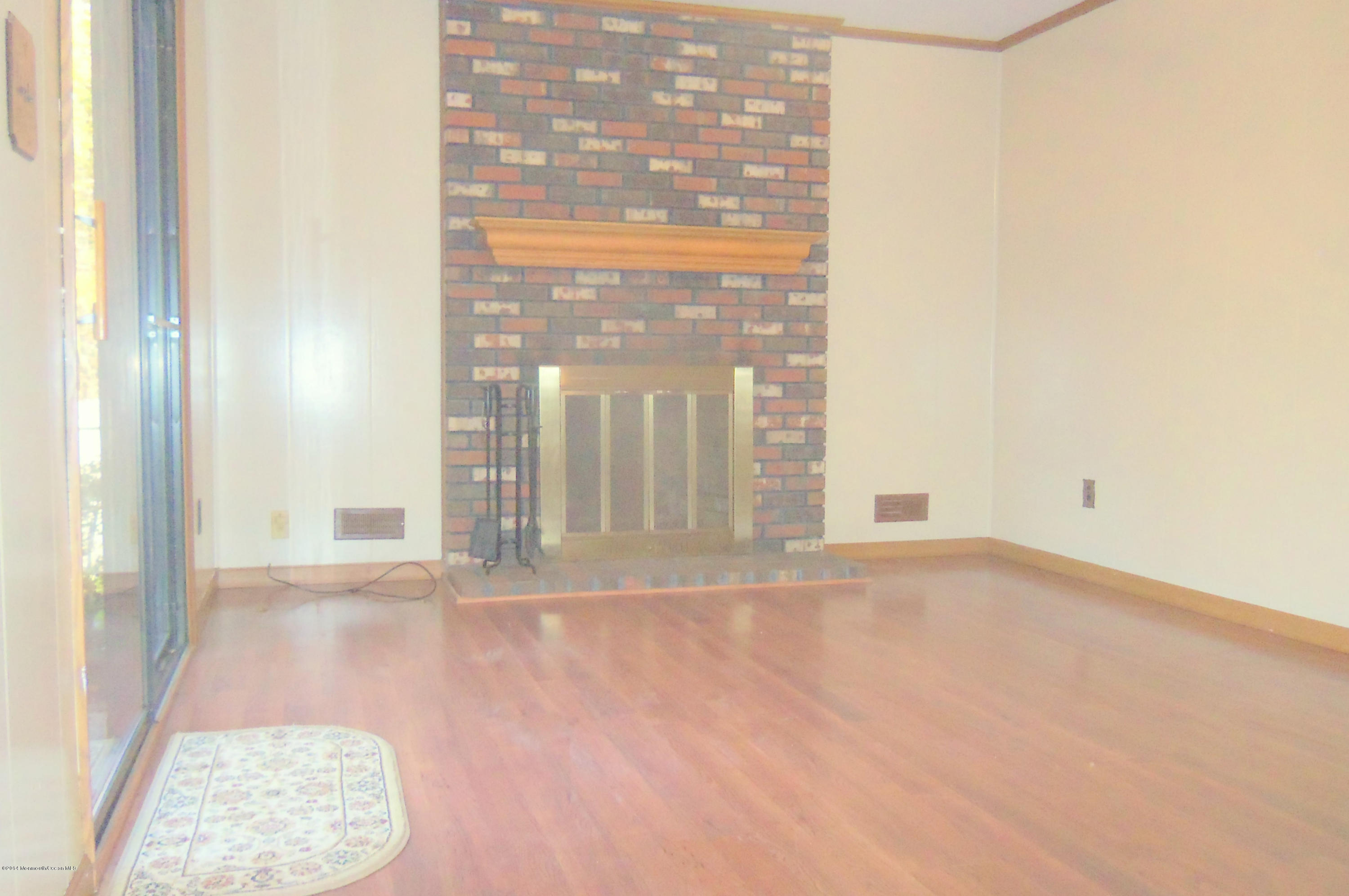 9 Colonial Court Howell, NJ 07731 - Photo 6 of 17 Family Room with Fireplace