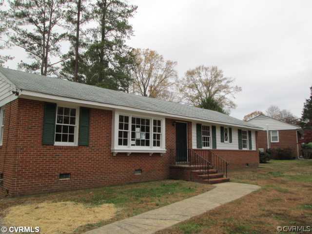 3940 Tanbark Road Richmond, VA 23235 - Photo 1 of 10 a front view of a house with yard porch and tree