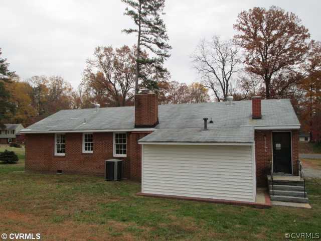 3940 Tanbark Road Richmond, VA 23235 - Photo 2 of 10 a view of a house with a large tree front of house