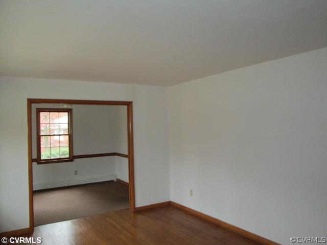 3940 Tanbark Road Richmond, VA 23235 - Photo 3 of 10 a view of an empty room and window