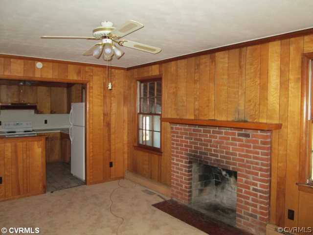 3940 Tanbark Road Richmond, VA 23235 - Photo 6 of 10 a bathroom with a granite countertop sink and a mirror