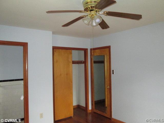 3940 Tanbark Road Richmond, VA 23235 - Photo 8 of 10 a view of an empty room with wooden floor