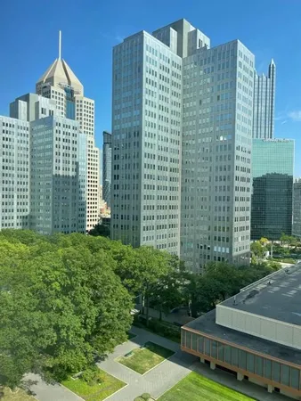 a view of a city with tall buildings