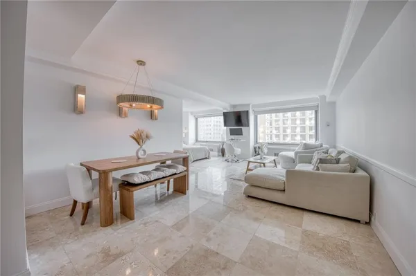 a living room with furniture and a window