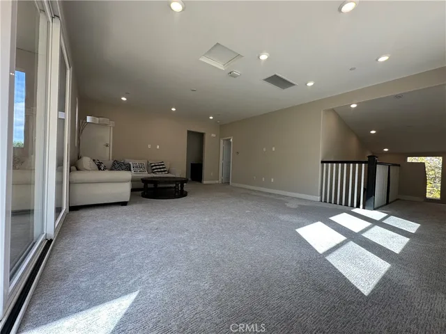 a view of entryway with livingroom