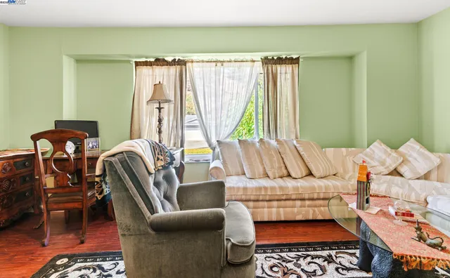 a living room with furniture and a couch