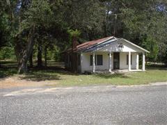 1864 Wadsworth Road Baker, FL 32531 - Photo 1 of 1 a front view of house with yard and green space