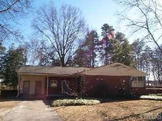 3628 Bond Street Raleigh, NC 27604 - Photo 1 of 1 a front view of a house with a yard