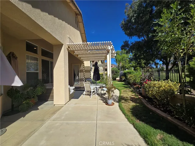 a view of a yard with tree s