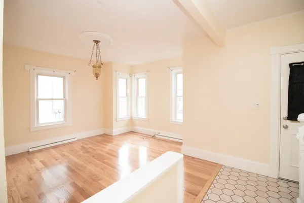 a view of an empty room and window