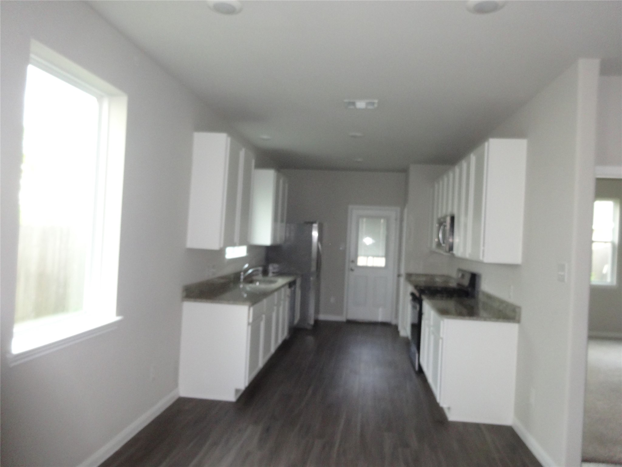 2116 Graham Pt Way Conroe, TX 77301 - Photo 3 of 13 Kitchen area