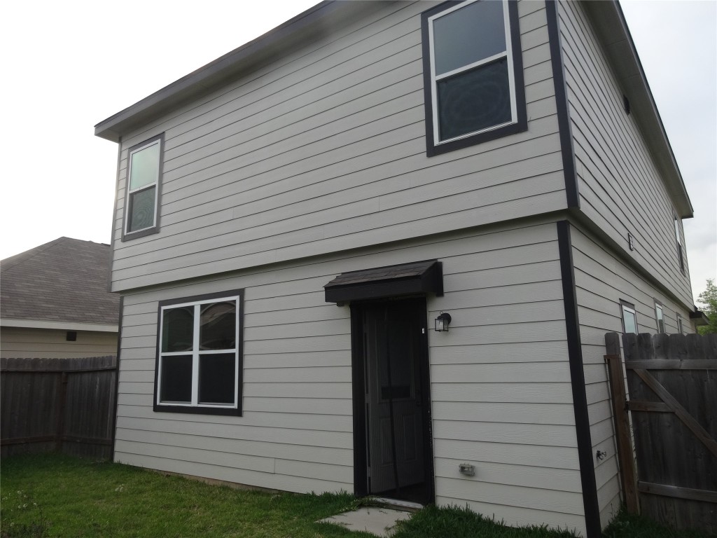 2116 Graham Pt Way Conroe, TX 77301 - Photo 7 of 13 rear view and fenced back yard