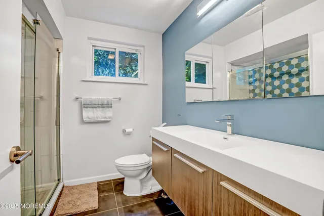 a bathroom with a sink and a toilet