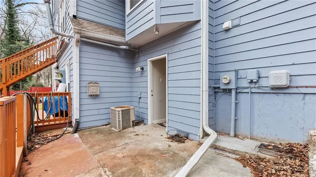 a view of a wooden door of the house