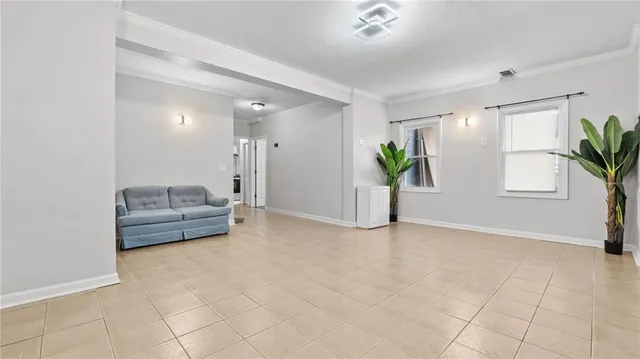 a view of livingroom with furniture and window