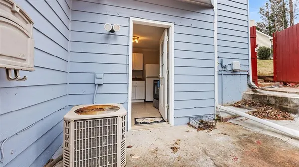 a view of a door and a window