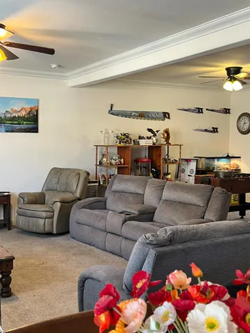 a living room with furniture and a couch