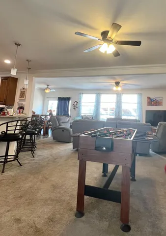 a room with furniture and a chandelier