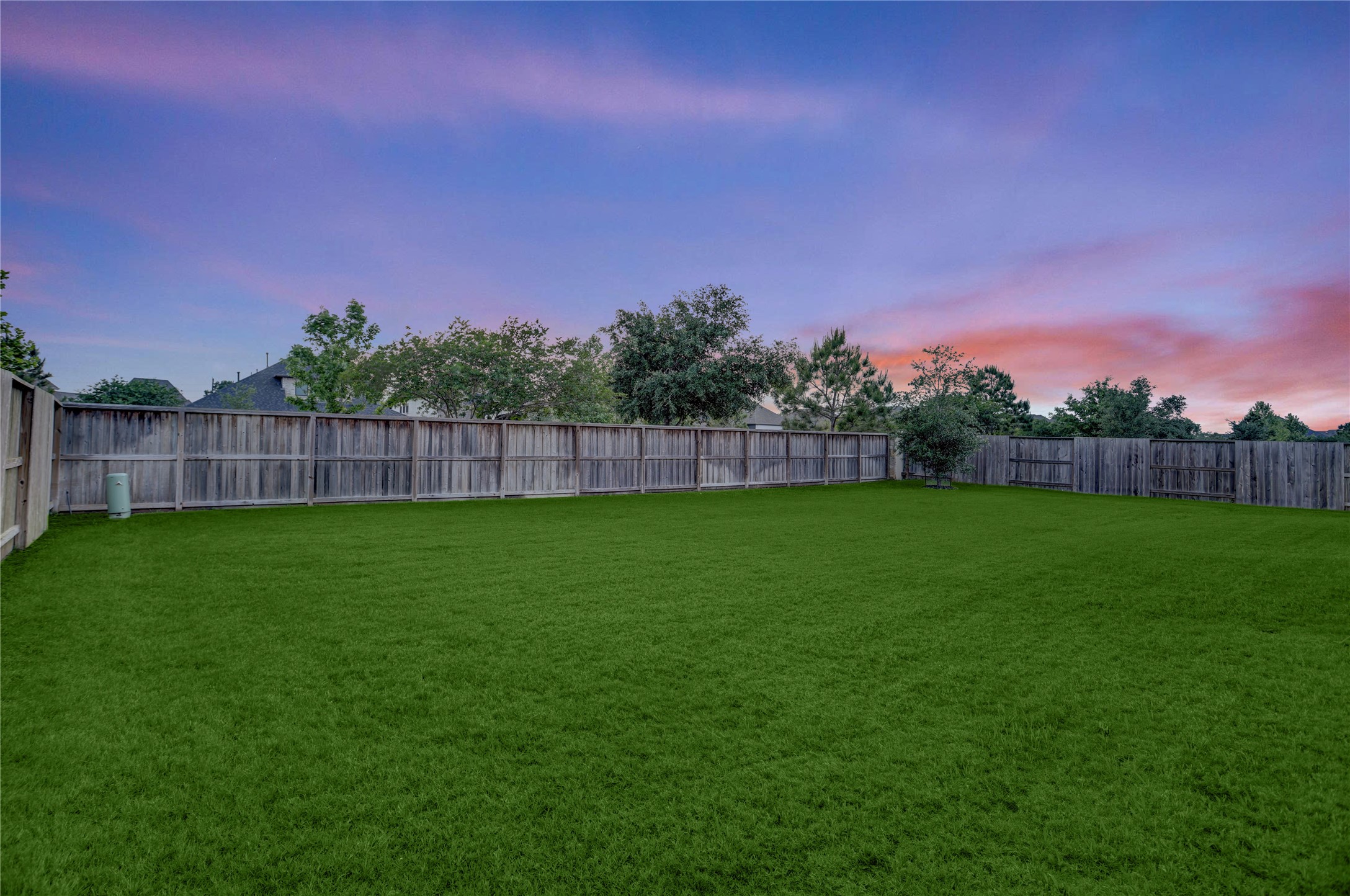 9818 Wright Drive Manvel, TX 77583 - Photo 26 of 32 a view of yard with grass and a trees