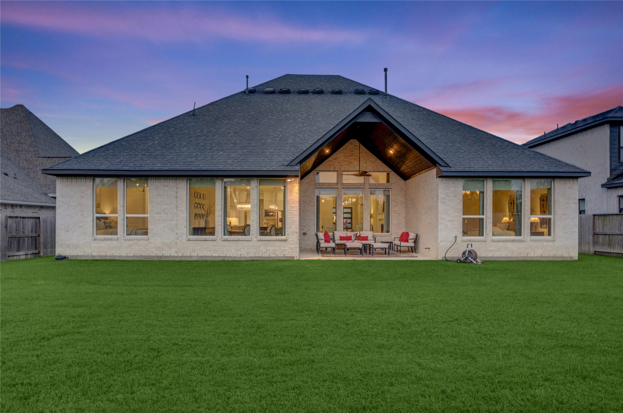 9818 Wright Drive Manvel, TX 77583 - Photo 28 of 32 a front view of a house with a garden
