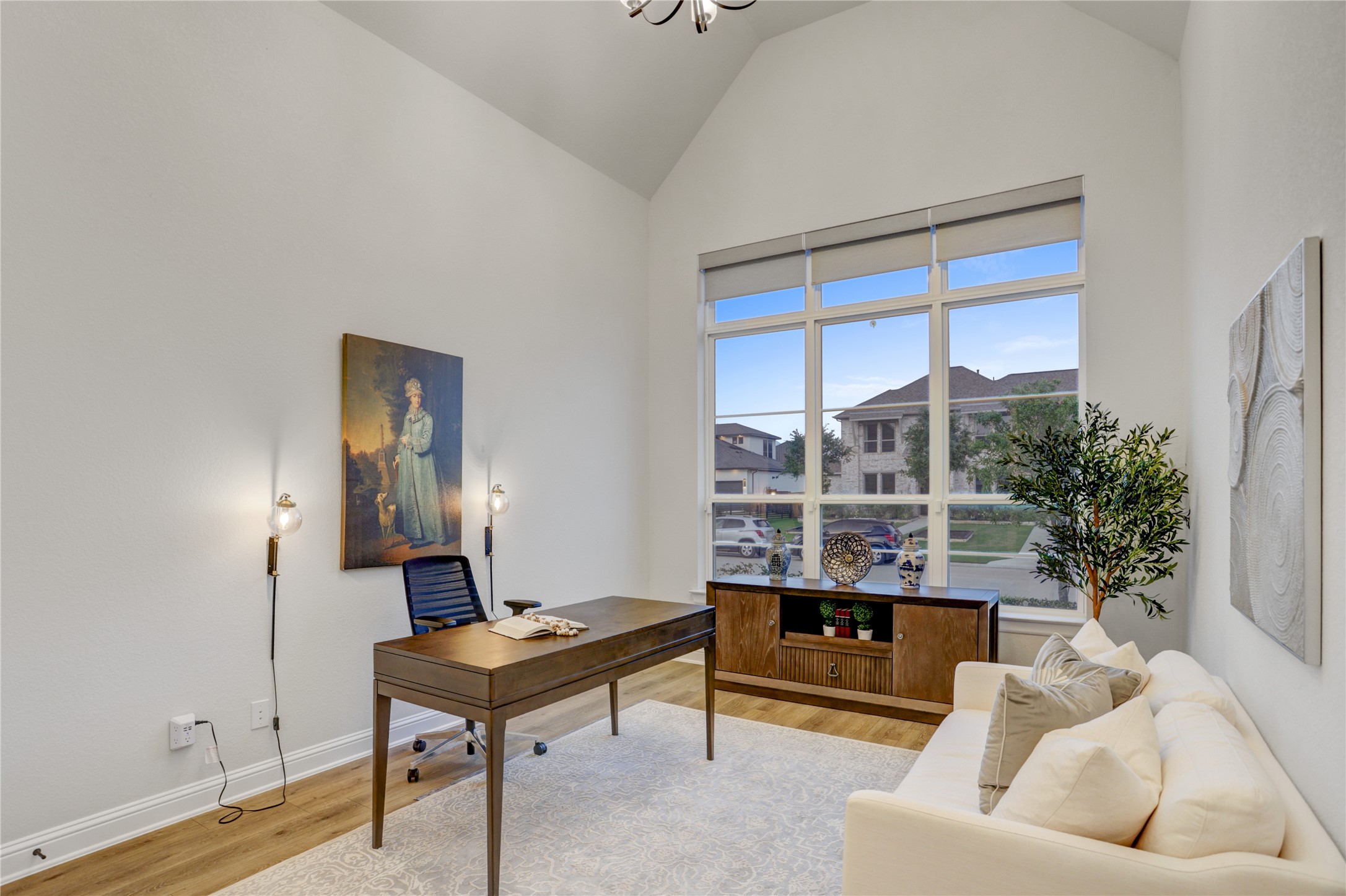 9818 Wright Drive Manvel, TX 77583 - Photo 4 of 32 a living room with furniture a rug and a potted plant