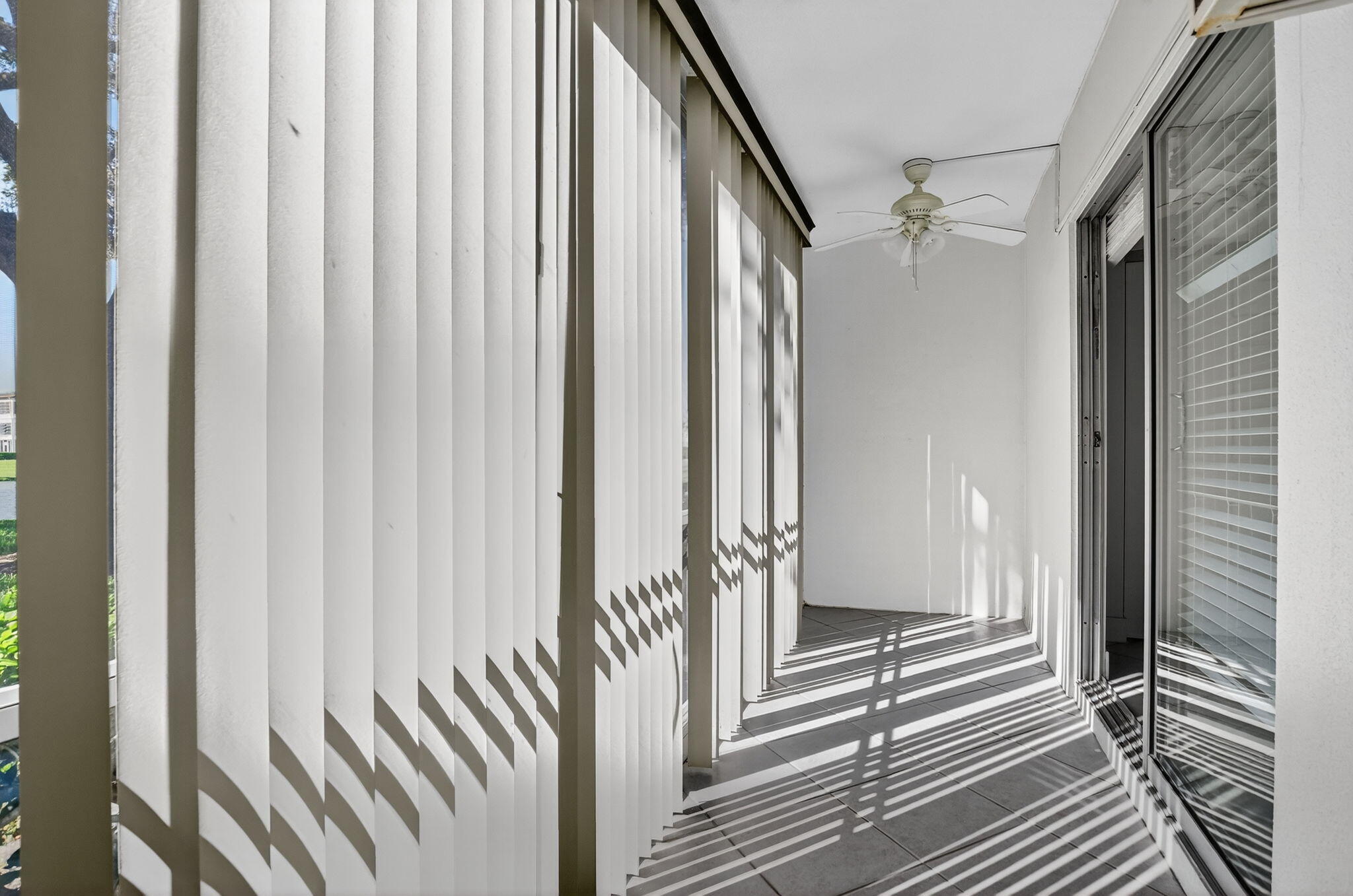 177 Fanshaw East, Unit 177 Boca Raton, FL 33434 - Photo 20 of 70 a view of a bathroom with a glass door