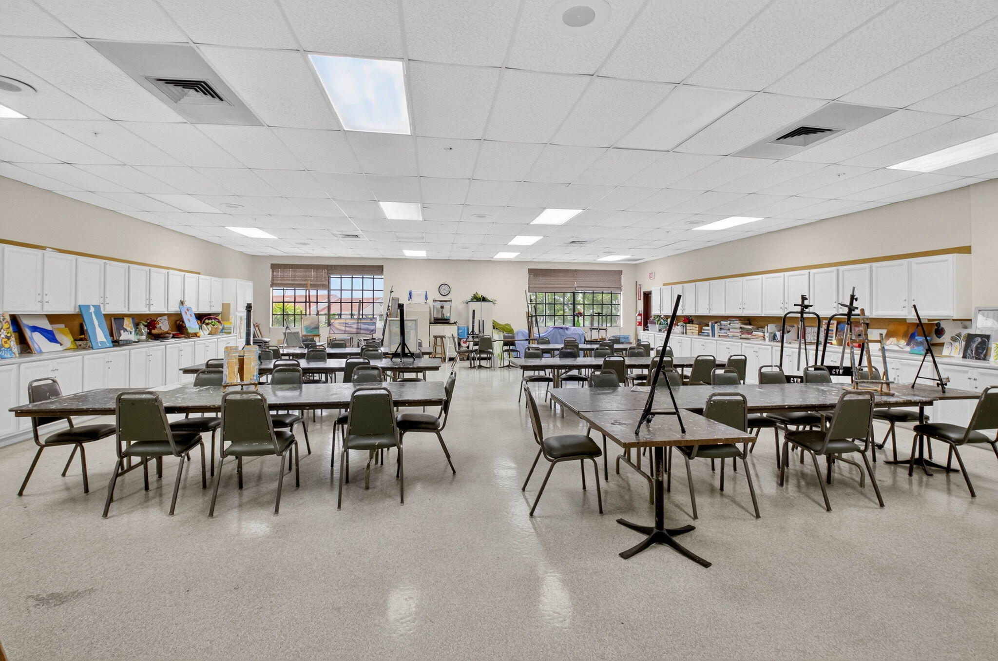 177 Fanshaw East, Unit 177 Boca Raton, FL 33434 - Photo 67 of 70 a group of people sitting in a room